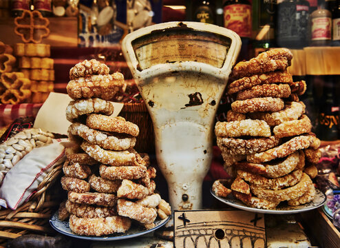 Old fashioned food scale with two large piles of torreznos, a traditional Spanish tapa, thick strips of fried pork belly, Toledo, Spain, Europe