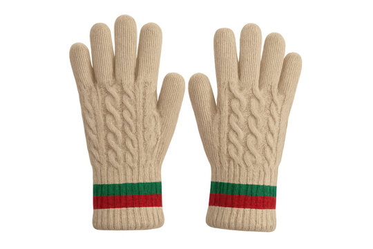 Pair of beige knitted wool gloves with cable knit pattern and distinctive red and green stripe details, transparent background