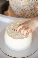 family tradition of celebrating the first child's birthday every month