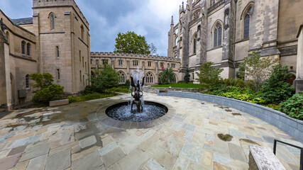 Courtyard fountain at Washington National Cathedral with gothic architecture in background