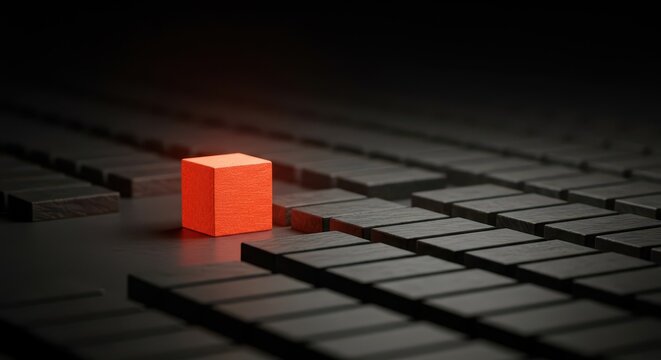 A distinct block stands alone, breaking free from the uniform arrangement, symbolizing self-determination, autonomy, and individuality, shape, choice, different