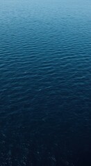 Obraz premium A vast, deep blue ocean representing the overwhelming and treacherous nature of chronic deception and dishonesty spreading across the world, submerged, deep, abstract