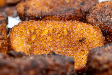 Close-up of traditional Spanish torrijas, slices of fried bread soaked in milk, sugar, and cinnamon. A typical homemade Easter dessert.