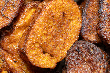 Close-up of traditional Spanish torrijas, slices of fried bread soaked in milk, sugar, and cinnamon. A typical homemade Easter dessert.