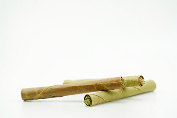 blunt cigar that has nature leaf and filled with cannabis. blunt marijuana tobacco leaf joint, marijuana blunt cigar, cannabis blunt cigarette prerolled Stick real photo white background