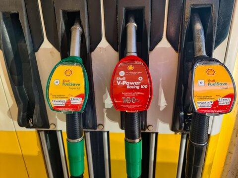 Kiel, Germany - 05. November 2025: Shell fuel pump nozzles offering gasoline and diesel in Germany