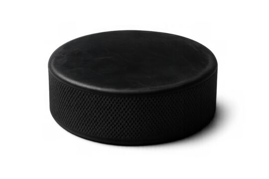 Ice hockey puck, regulation standard black rubber game equipment for winter athletic sports, isolated with transparent background