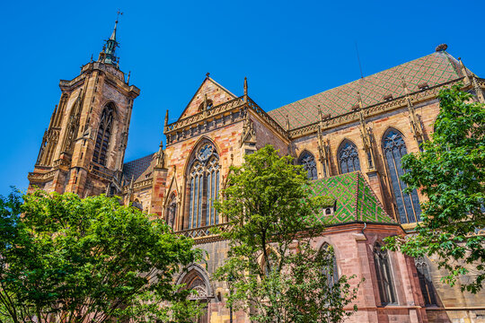 Colmar, Alsace, France: Side view of the medieval gothic cathedral of Colmar; famous travel landmark