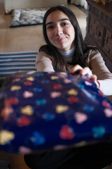 Fototapeta premium young girl reciving christmas gifts