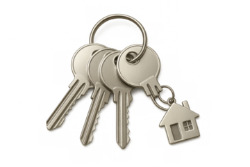 House keys with small home symbol on a keychain, representing real estate ownership and property investment