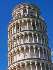 Close up top of Leaning Tower of Pisa in Italy. Architectural detail
