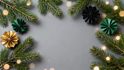 Festive holiday arrangement featuring evergreen branches, colorful paper ornaments, and warm bokeh lights on a neutral gray background.