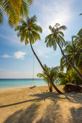 Tropical island beach landscape exotic shore coast. Tranquil closeup calm sea water waves with palm trees. Beautiful Panorama. Summer vacation, holiday amazing nature. Relax paradise, Maldives.