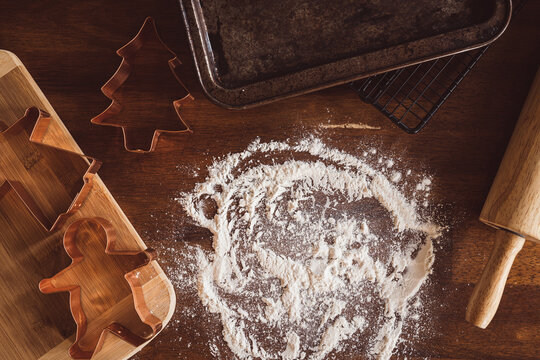 flour, rolling pin and cookie cutters ready for baking cookies - Powered by Adobe