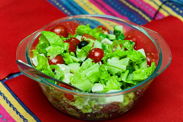 Fresh Salad Prepared in Glass Bowl With Mediterranean Ingredients
