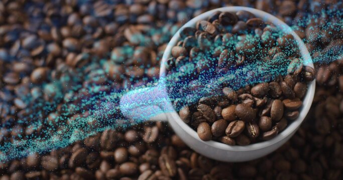 Showing white ceramic cup holding roasted coffee beans on tabletop, with turquoise data stream, arc