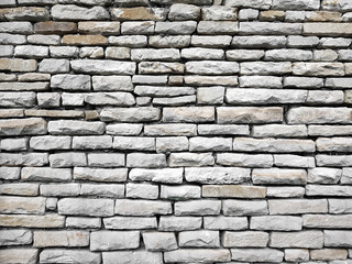 Background of unshape stone or rock wall.