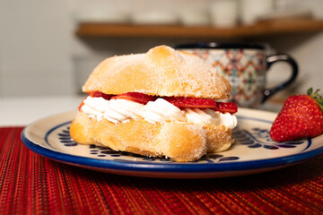 Mexican Breakfast with Coffee and Sweet Bread on Tablecloth