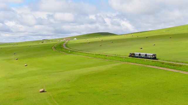 A small train on the grasslands of Inner Mongolia Scenic Area