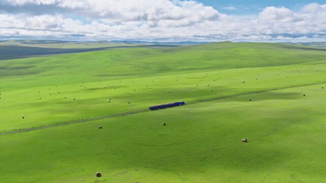 A small train on the grasslands of Inner Mongolia Scenic Area