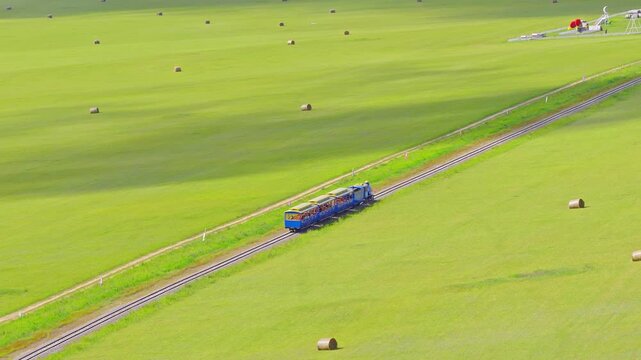 A small train on the grasslands of Inner Mongolia Scenic Area