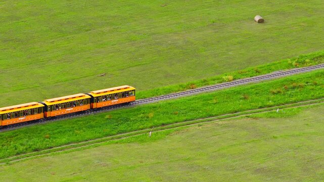 A small train on the grasslands of Inner Mongolia Scenic Area