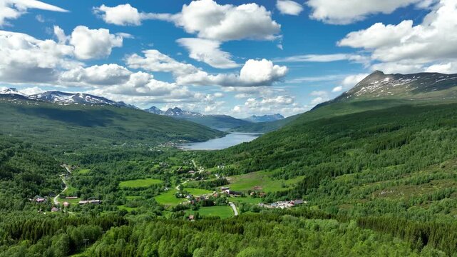 Aerial of a small town at the end of a fjord on the  amazing coastline of northern Norway.