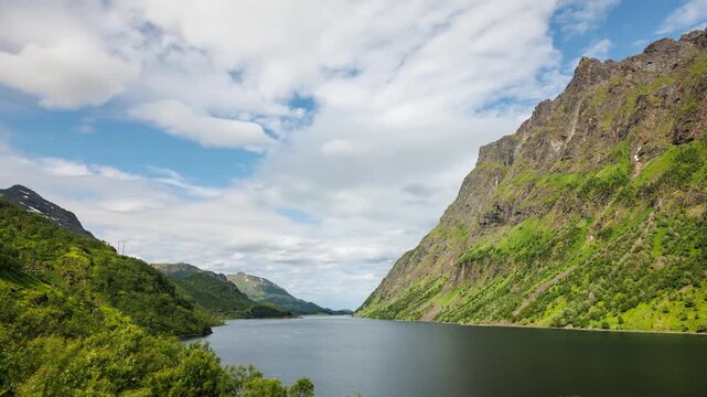 Time lapse of the clouds moving above the  amazing coastline and mountains of Norway.