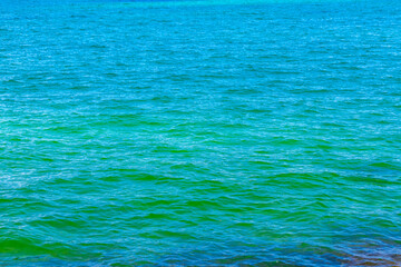 Obraz premium Rock rocks boulder boulders in turquoise green blue water Brazil.