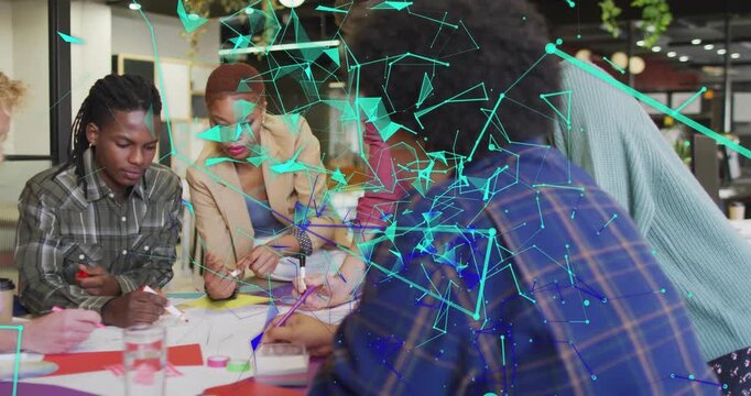 Design team starting drawing sharing pens, pointing notes for UX, teal network overlay drifting