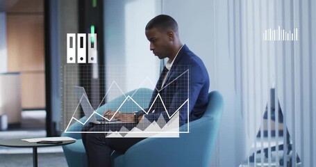 Businessman typing on laptop, initiating animated flowchart and charts visualizing data on lap - Powered by Adobe