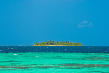Small island. Summer vacation, holiday amazing nature. Relax paradise, Maldives. Tropical island beach landscape exotic shore coast. Tranquil closeup calm sea water waves with palm trees.