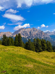 Fototapeta premium Mountain trips. Hiking in the Italian Dolomites. Landscapes and trails in the Alps. Active holidays in the mountains