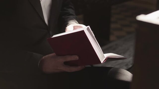 Quiet Moment of Worship Man Reading Bible in Church