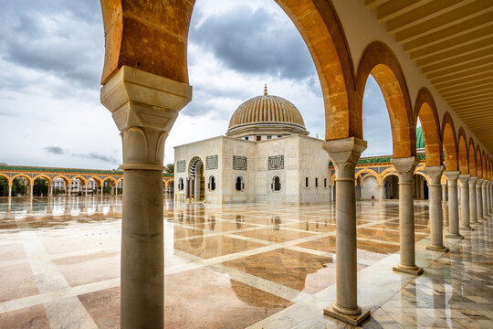 Mausoleum of Habib Bourguiba on a cloudy day with decorated marble courtyard, Monastir