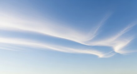 Clear Midday Blue Sky with Gently Flowing Clouds