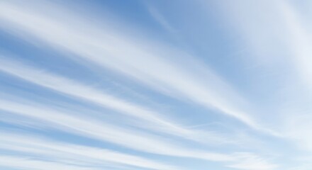 Clear Midday Blue Sky with Gently Flowing Clouds