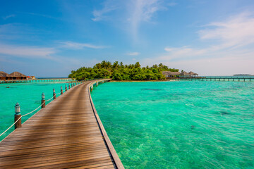 Pathway to bungalows. Summer vacation, holiday amazing nature. Relax paradise, Maldives. Tropical island beach landscape exotic shore coast. Tranquil closeup calm sea water waves with palm trees.