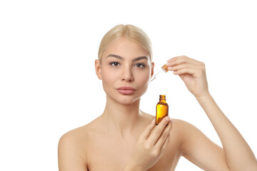 Fototapeta premium Woman readies serum in amber bottle, isolated on white, PNG