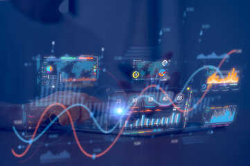 Businessman analyst uses a computer AI artificial intelligence and dashboard for data business analysis and Data Management System with KPI and metrics connected to the database for technology finance