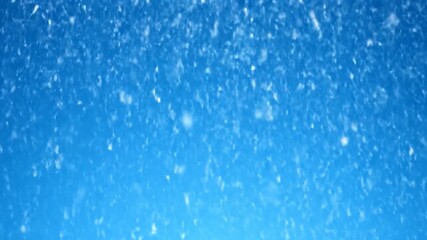 Abstract image of blue sky with soft, blurred white flakes falling, creating a wintery scene - Powered by Adobe