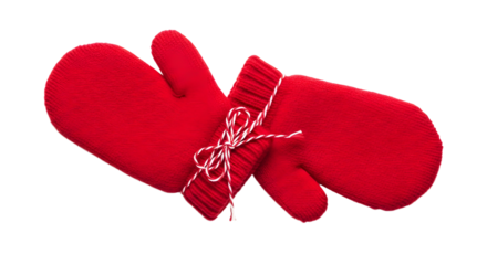 Gift - Red knitted mittens with a decorative white and red string tied around them isolated on white background, perfect for winter fashion and Christmas season