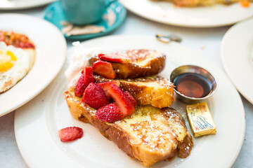 French Toast with Fresh Strawberries and Maple Syrup
