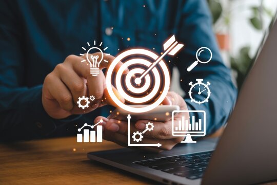 Person using smartphone with digital marketing icons floating around - Powered by Adobe