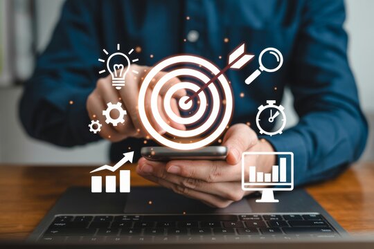 Person using smartphone with digital marketing icons floating around