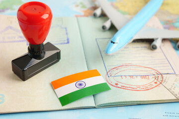 India passport with approved stamp on document for tourism to immigration at airport in country.