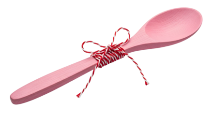 Gift - Pink wooden spoon with red and white striped twine bow, isolated on white background, perfect for cooking or kitchen decoration