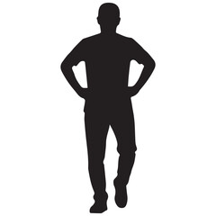 Silhouette of a man standing with hands on hips