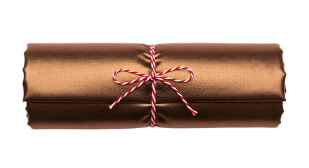 Gift - Rolled shiny copper foil tied with red and white string, isolated on white background, perfect for gift wrapping and craft projects