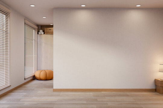 White wall and wooden parquet floor corridor hallway to corner with wardrobe and pumpkin stool sofa.